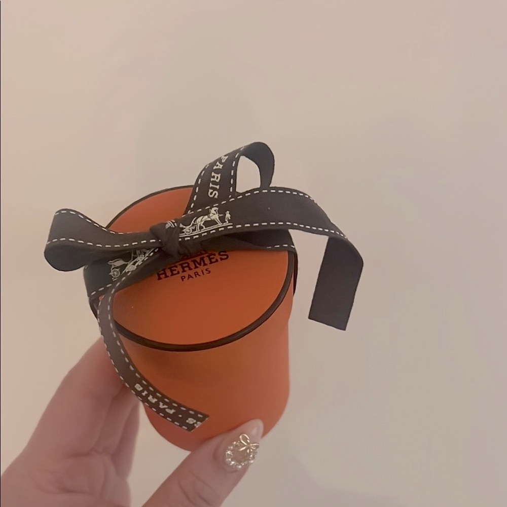 Hermes Orange Round Gift Box with Black Ribbon